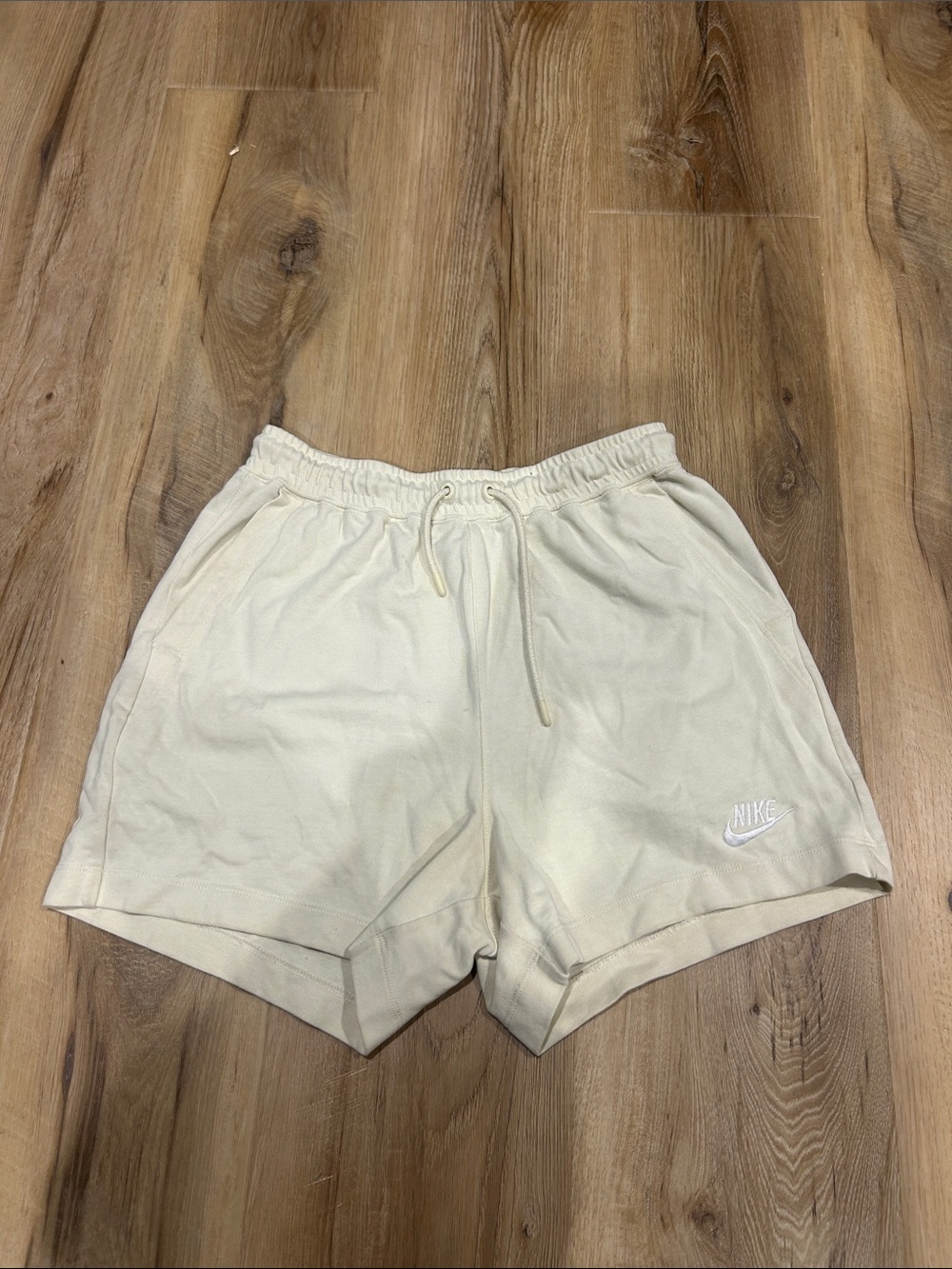 Nike Women's Light Cream Athletic Drawstring Shorts